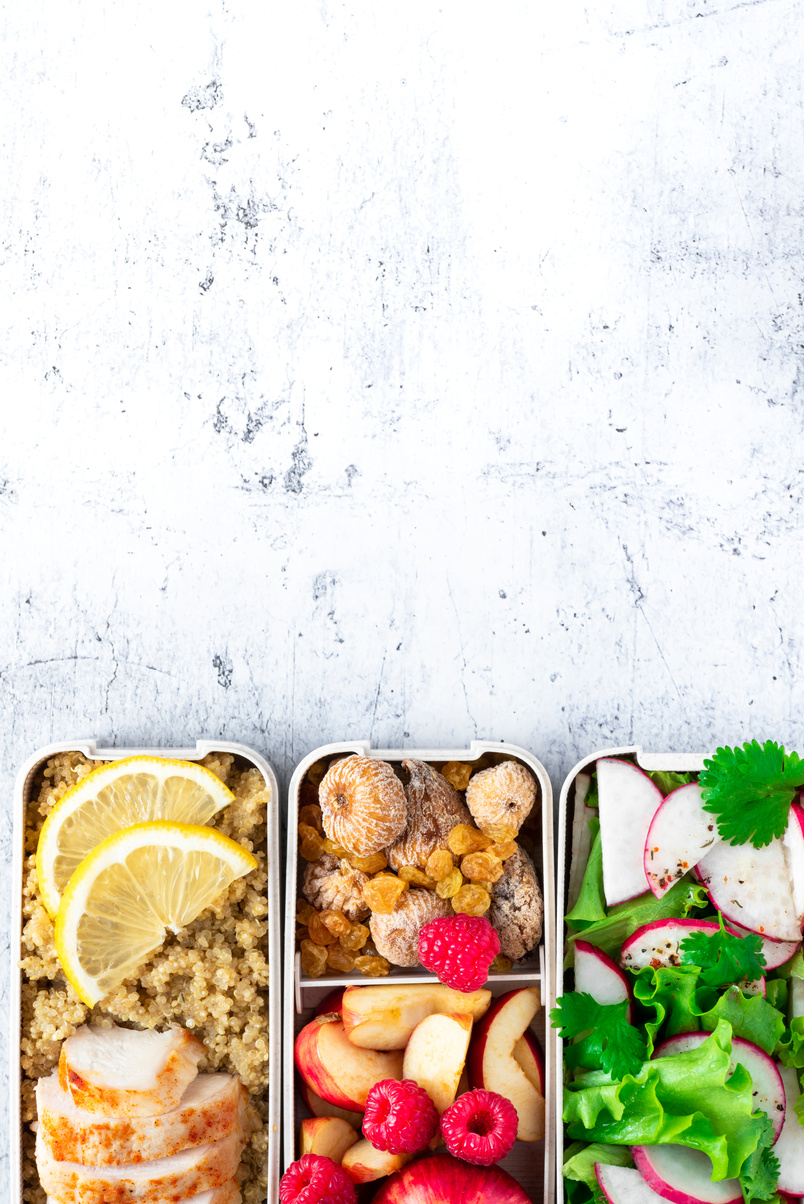 Lunchboxes with prepared healthy food.